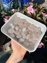 Load image into Gallery viewer, Low Grade Blue Rose Quartz Tumbles
